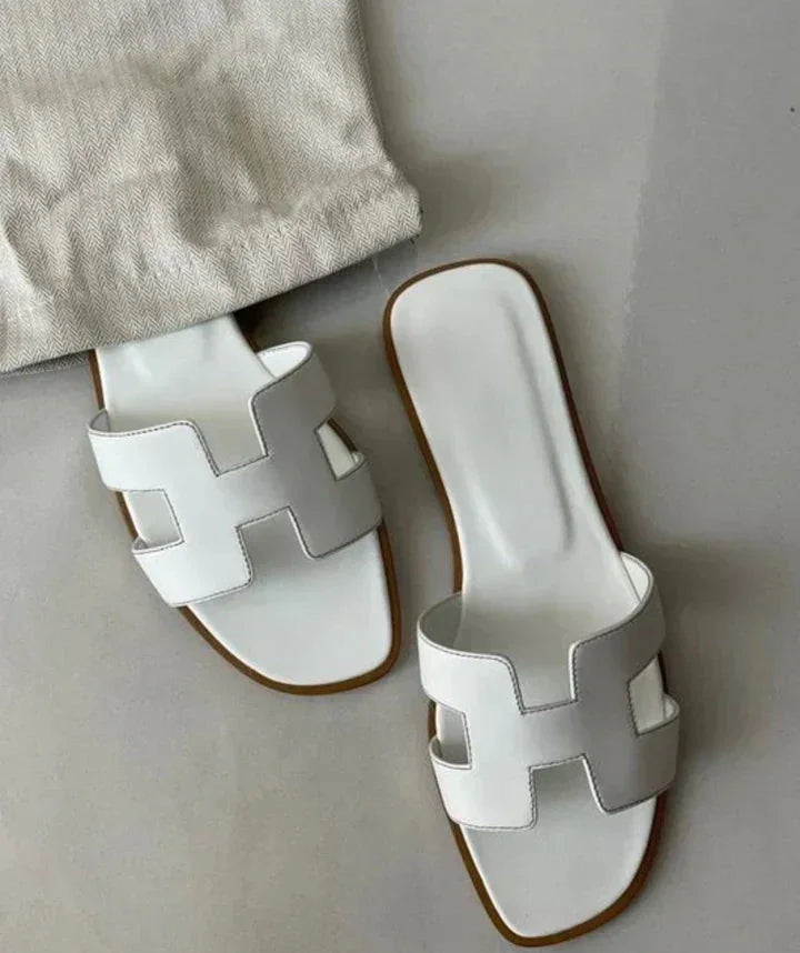 White Women's Leather H-Strap Sandals — Valerie Slip-On Flat - Front Flat Lay