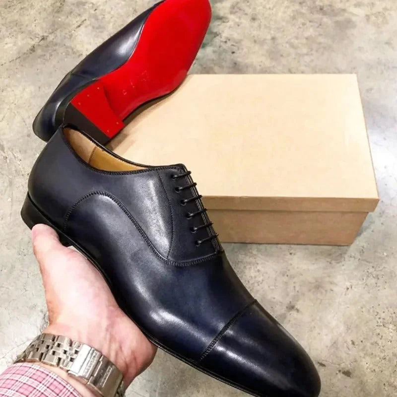 Black Men's Italian Leather Oxford Shoes — Hugo Cap Toe Business Formal - Hand Holding Detail