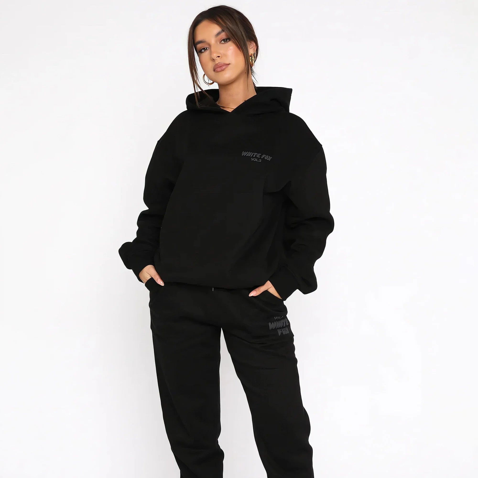 Black Women's Two-Piece Hoodie & Pants Tracksuit — Reagan Oversized Loungewear - Front Pose