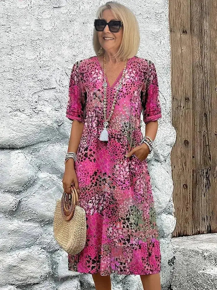 Hot Pink Women's Floral V-Neck A-Line Midi Dress — Zelda Half Sleeve Casual - Lifestyle Pose