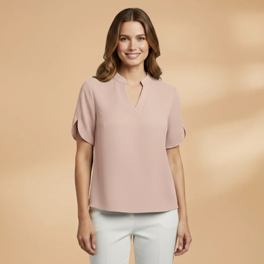 Light Pink Women's Lightweight V-Neck Blouse with Short Sleeves - Model Standing