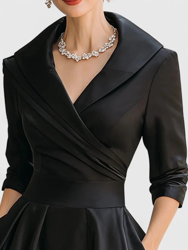 Black Women's V-Neck Satin Midi Dress — Lyla Pleated A-Line Cocktail - Close Up Neckline